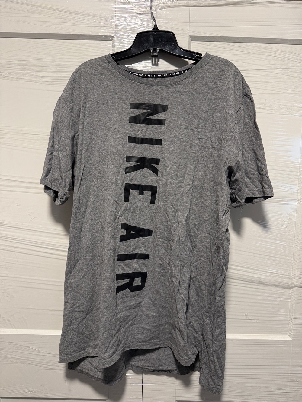 Nike Gray Short Sleeve Tee with Black Vertical 'NIKE AIR' Logo